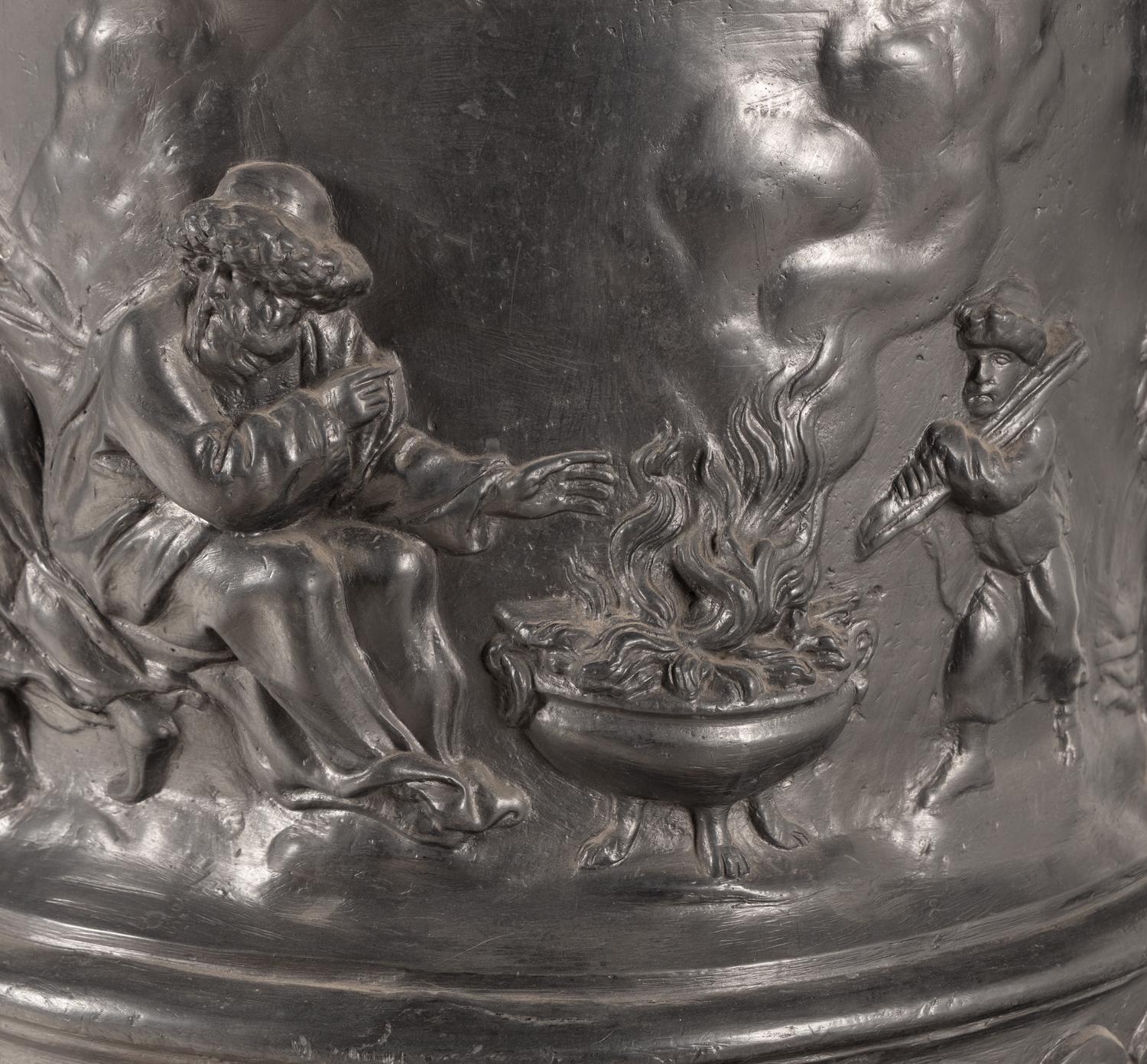 A Pair of English Lead Allegorical Garden Urns