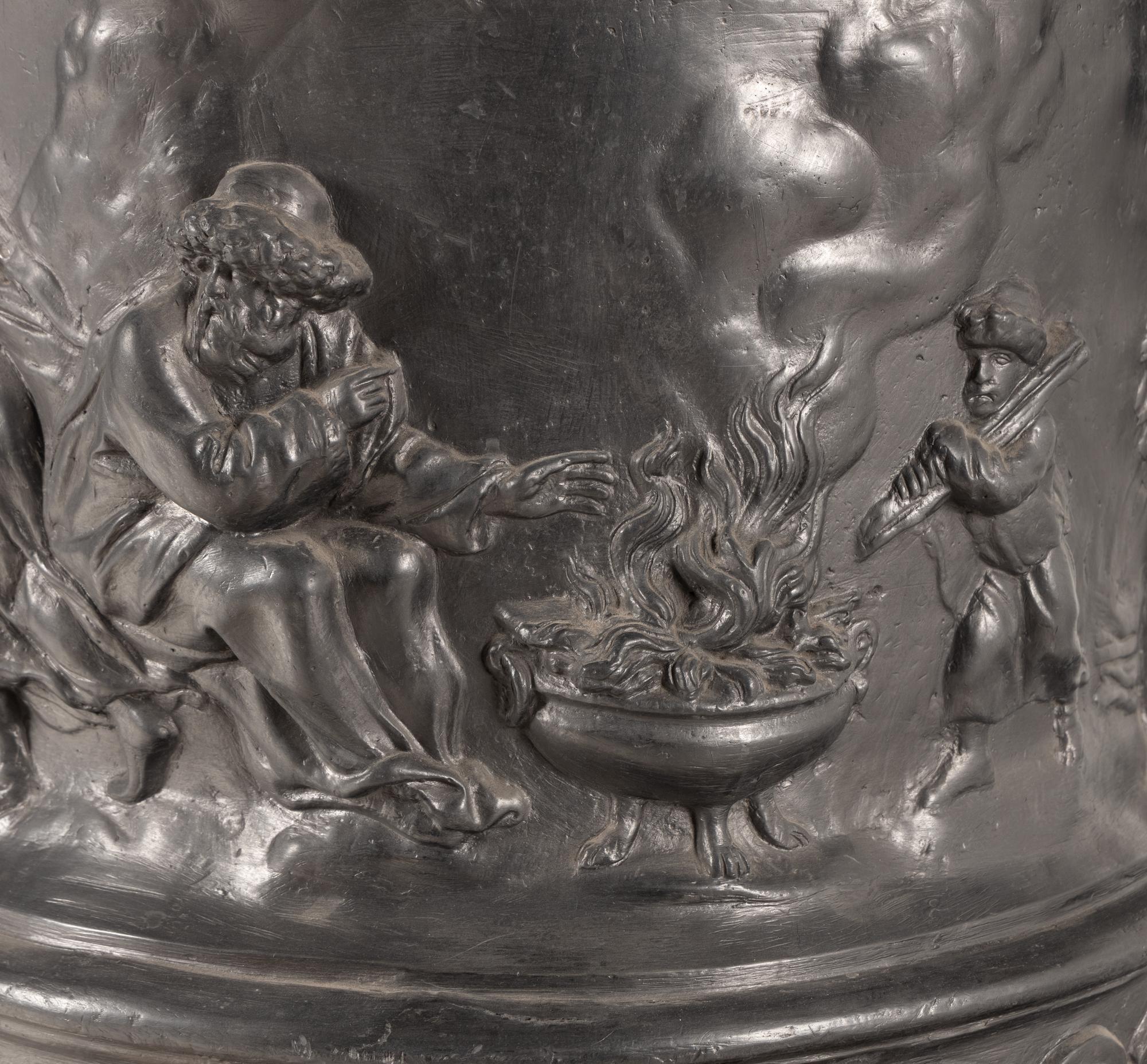 A Pair of English Lead Allegorical Garden Urns