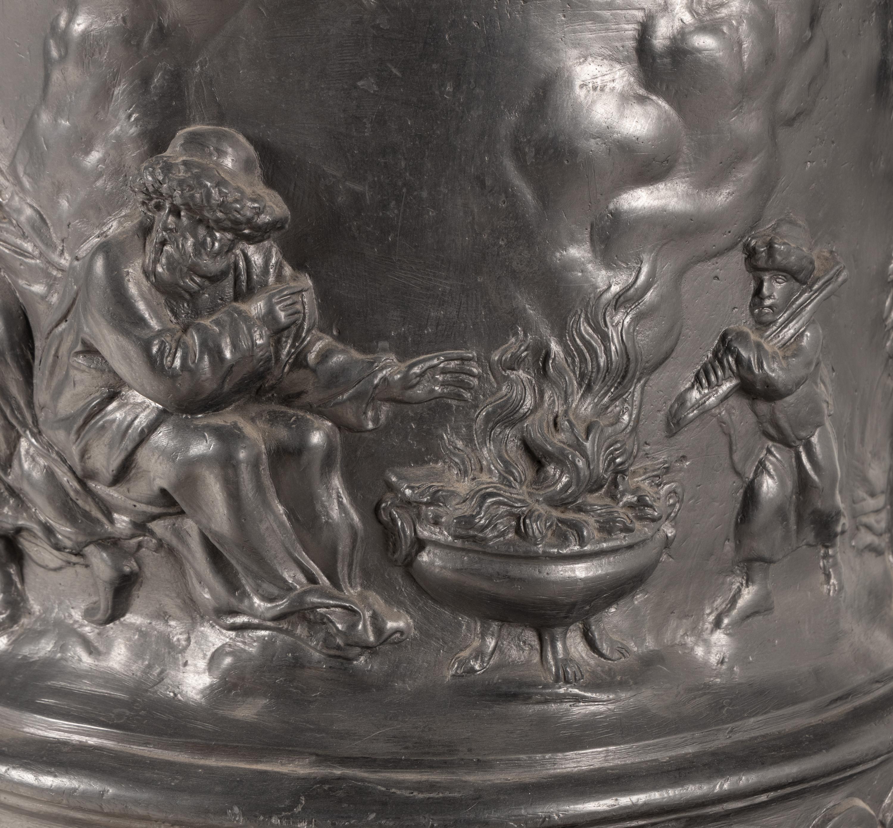 A Pair of English Lead Allegorical Garden Urns