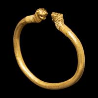 A Greek or Achaemenid Gold Bracelet with Lion Terminals