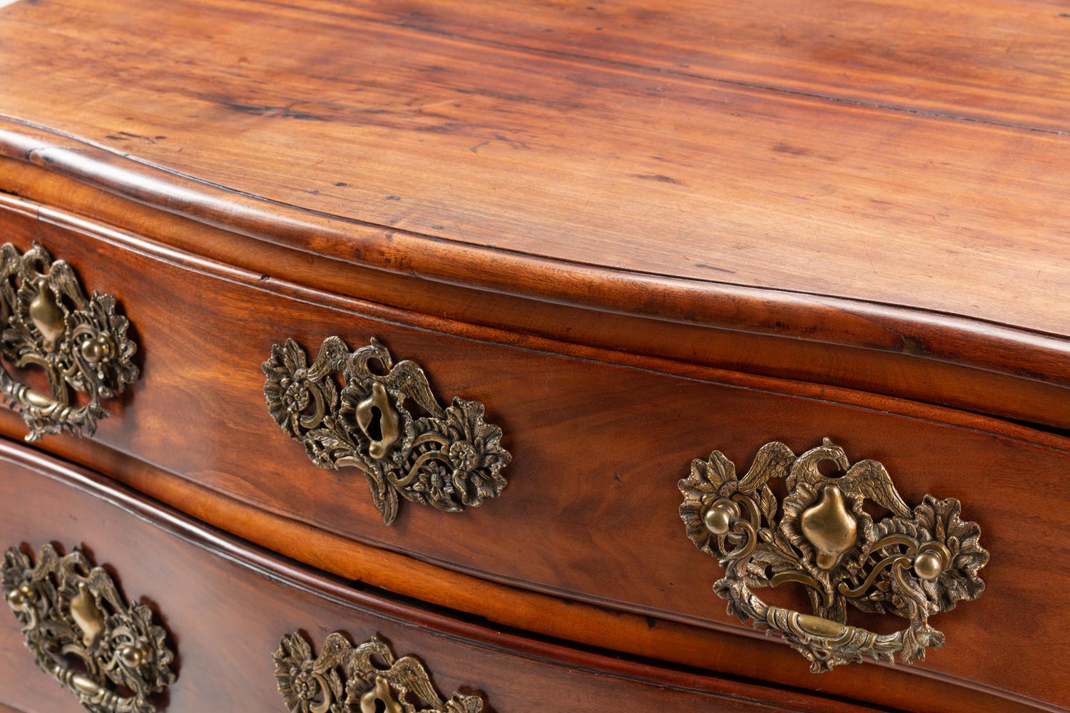 A Portuguese Carved Walnut Commode