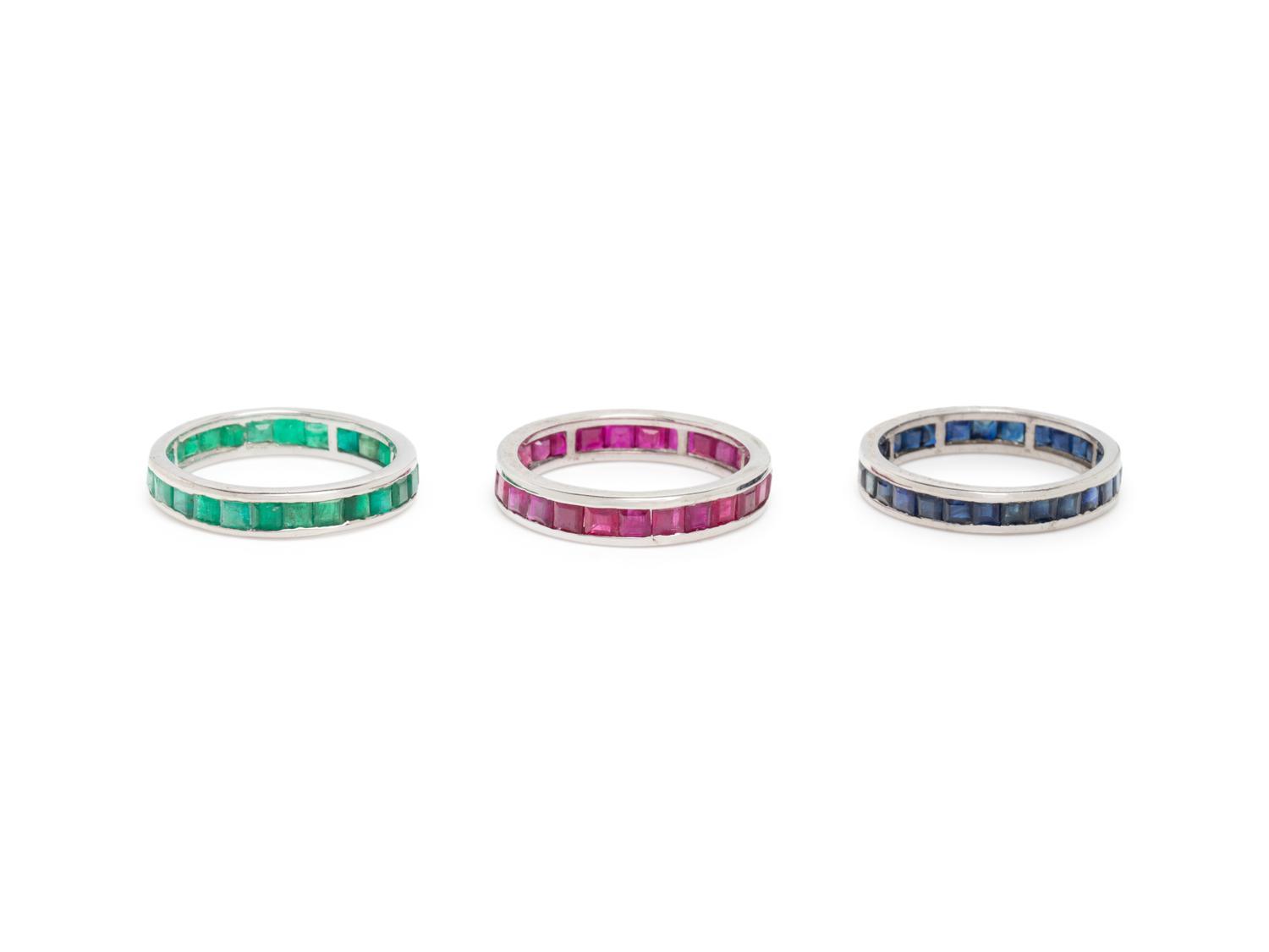 COLLECTION OF RUBY, SAPPHIRE, AND EMERALD BANDS