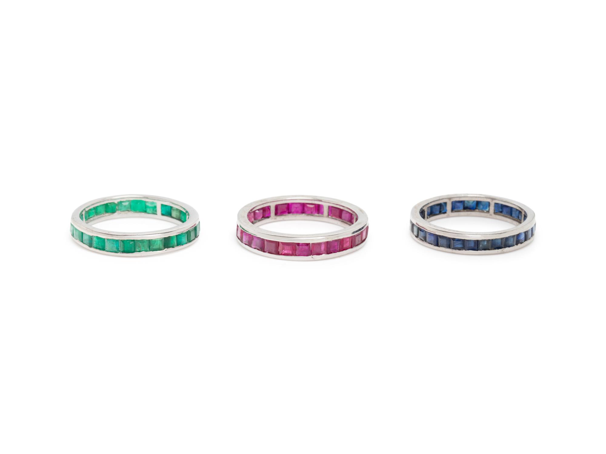 COLLECTION OF RUBY, SAPPHIRE, AND EMERALD BANDS