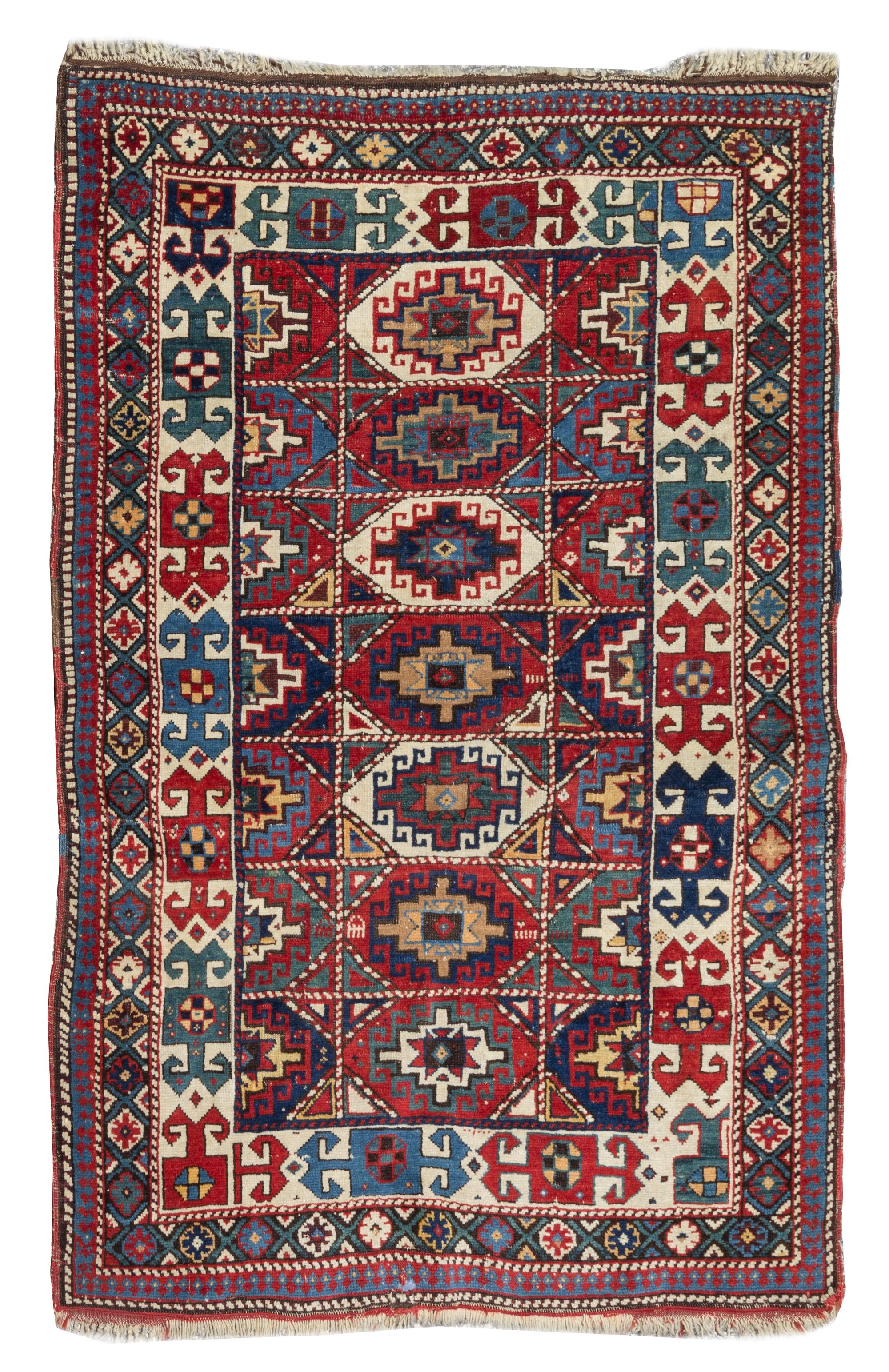 A Caucasian Rug 3 feet 10 inches x 2 feet 9 1/2 inches.