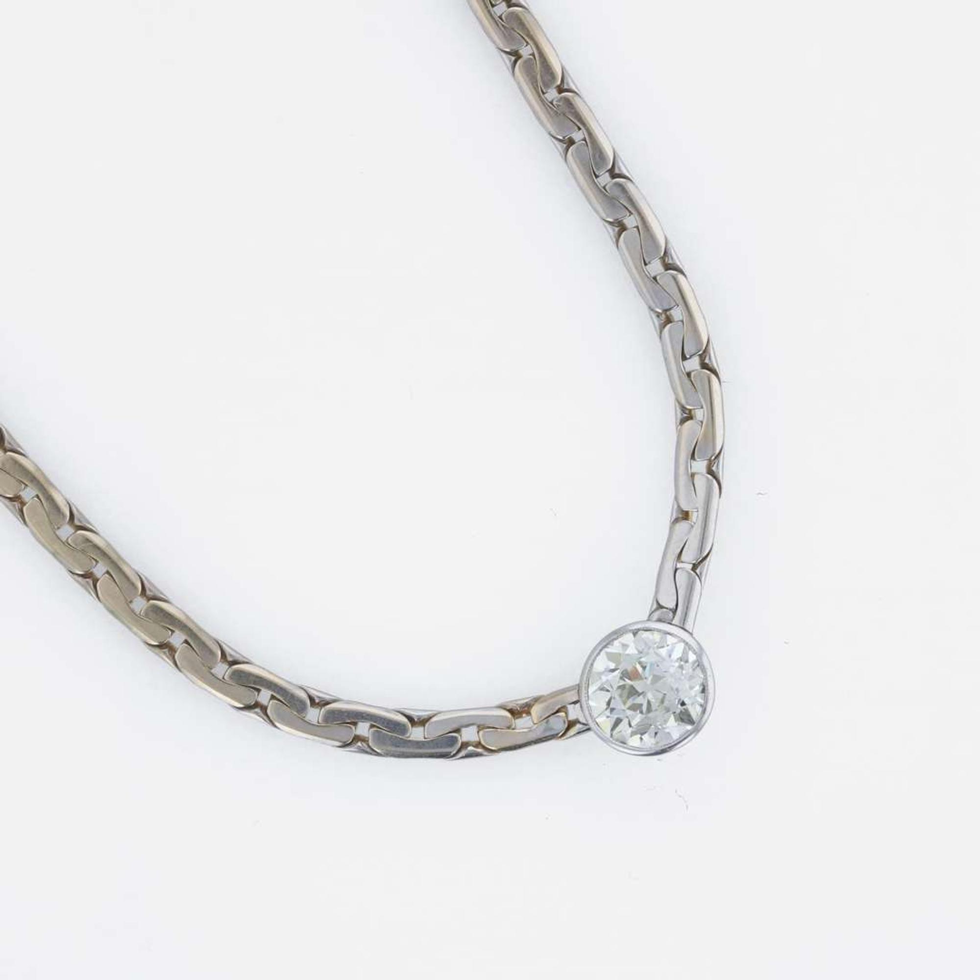 A 14K, white gold diamond station necklace