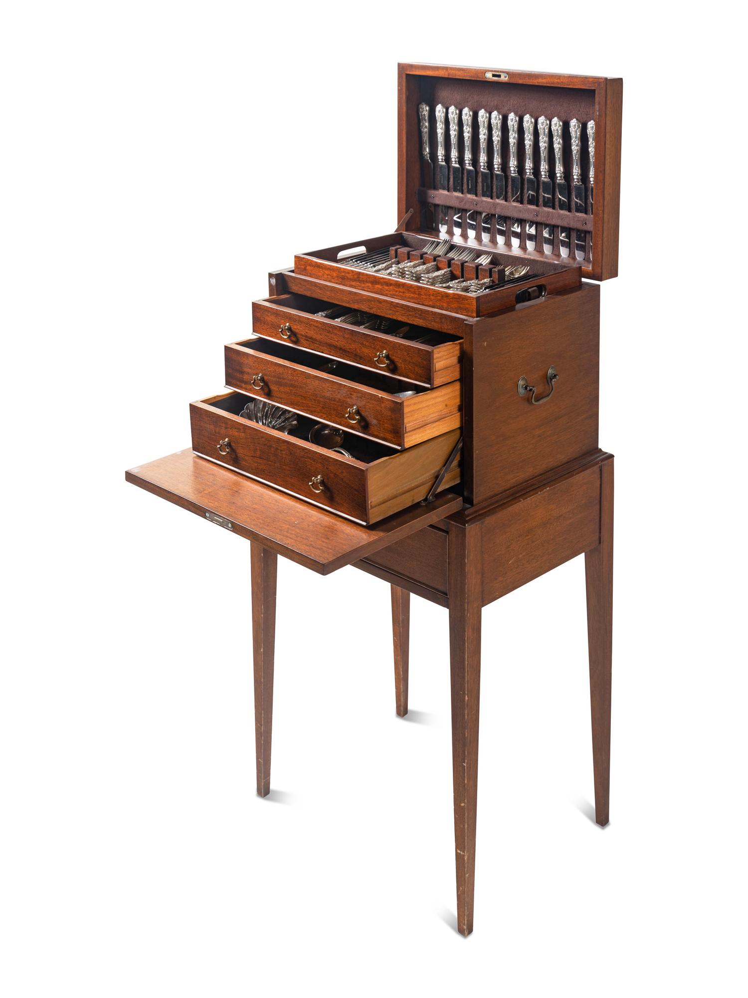 A Tiffany and Co. English King Silver Flatware Service in a Fitted Mahogany Chest