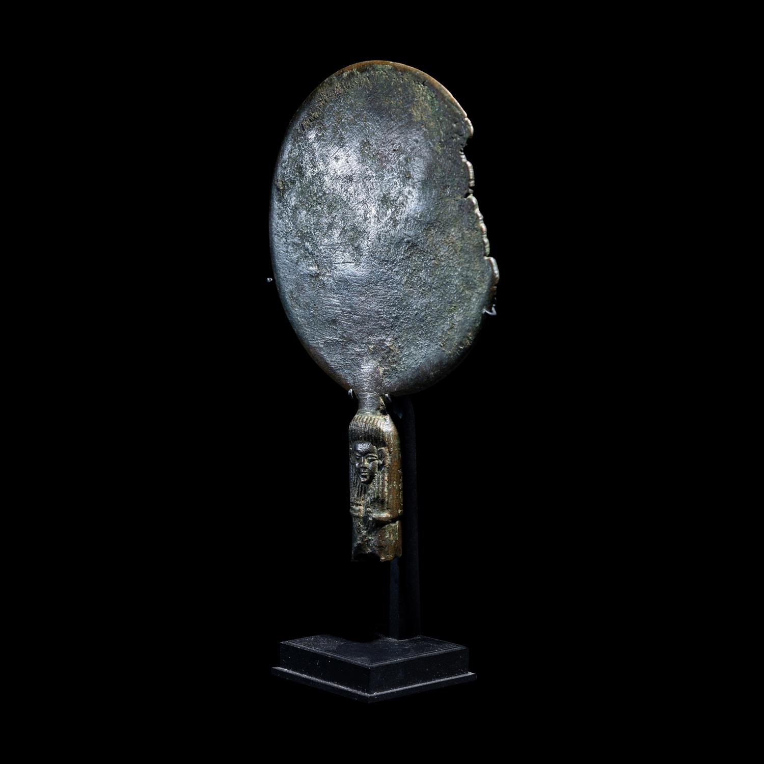 An Egyptian Bronze Mirror