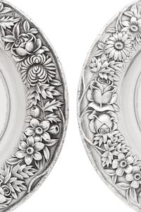 A Pair of S. Kirk and Son Silver Repoussé Compotes
