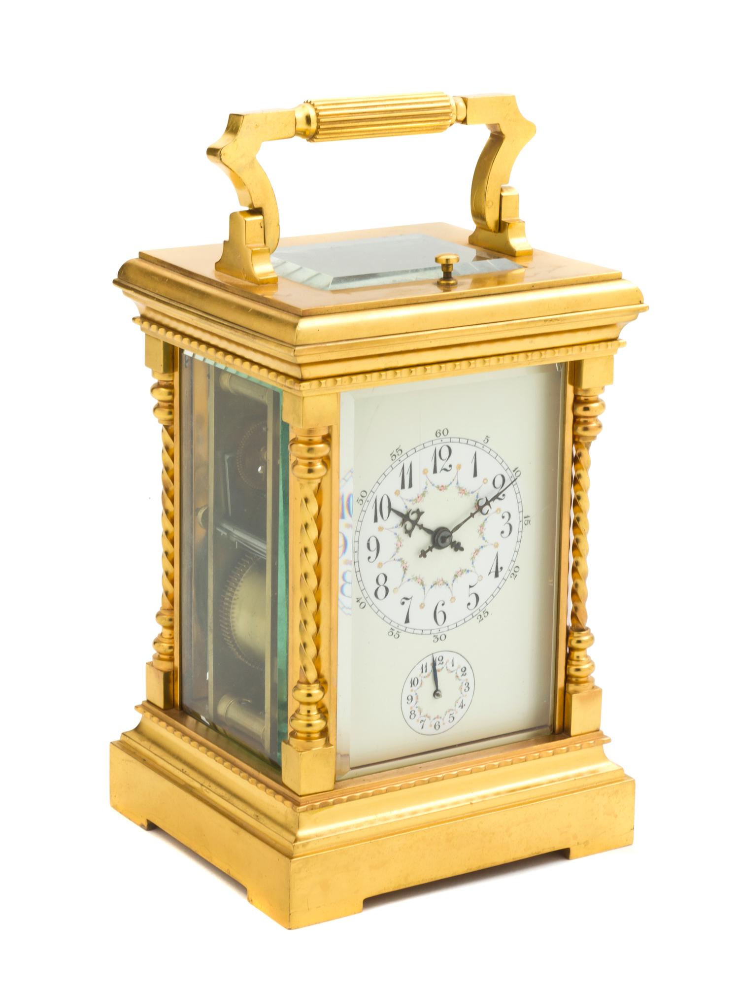 A French Bronze and Glass Repeater Carriage Clock, Height 6 1/4 inches.