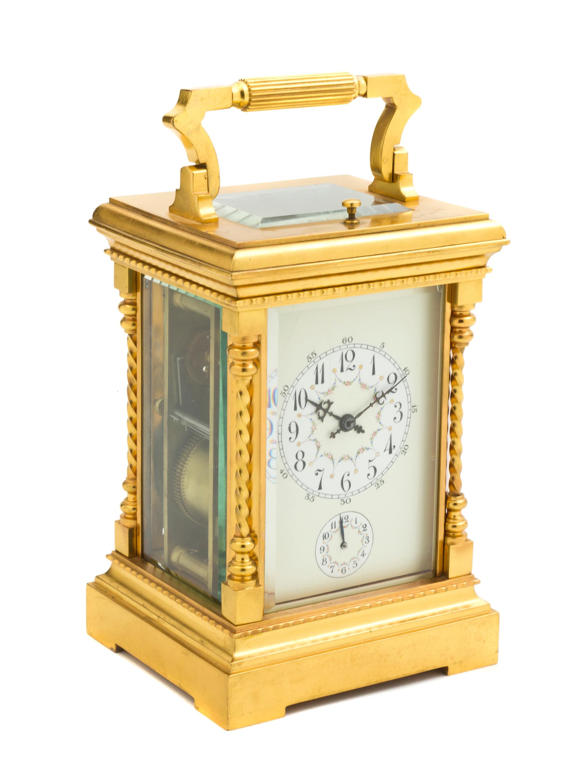 A French Bronze and Glass Repeater Carriage Clock, Height 6 1/4 inches.