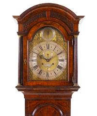 An English Walnut Tall Case Clock