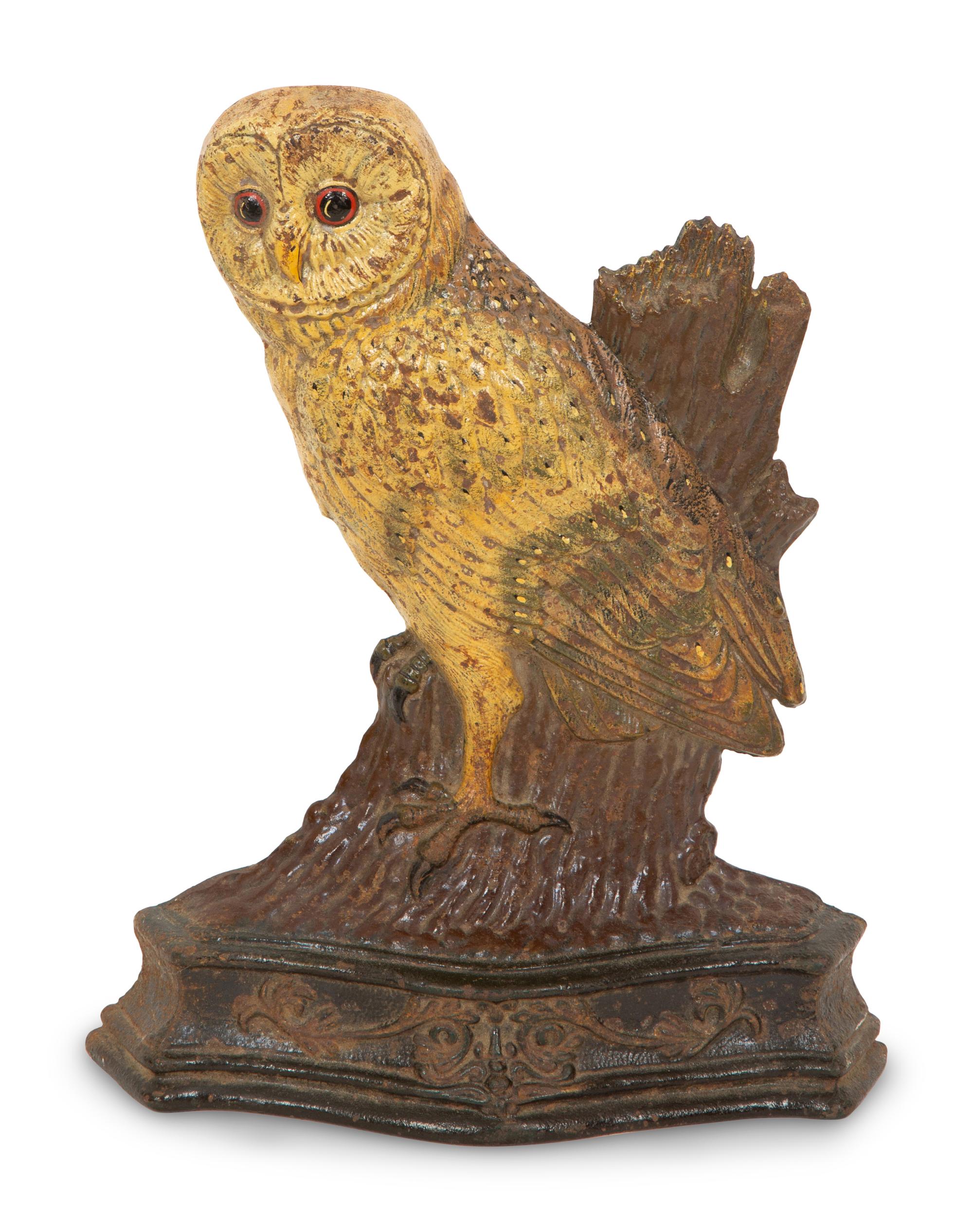 A Painted Cast Iron Owl Doorstop