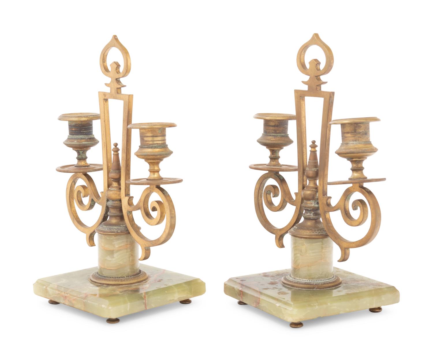 A Pair of Russian Gilt Bronze and Onyx Two-Light Candlesticks