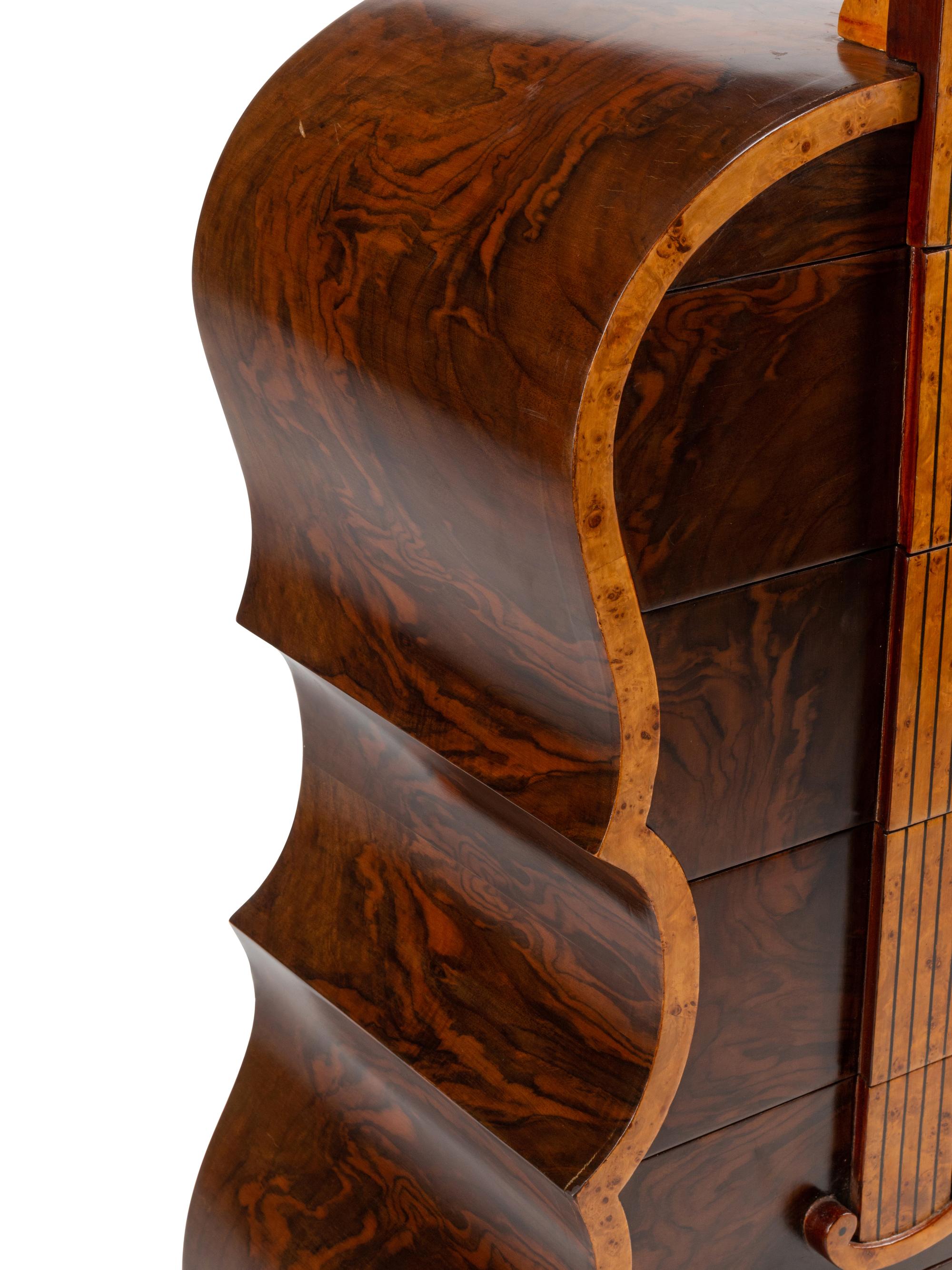 A Continental Burlwood and Walnut “Cello” Cabinet