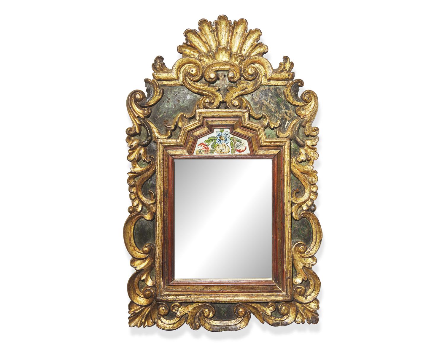 A rare Northern European polychrome and giltwood and églomisé courting mirror, early 18th century
