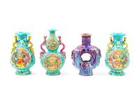 Four Chinese Carved Porcelain Vases