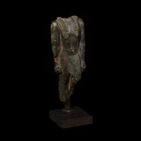 ANCIENT EGYPTIAN TORSO OF A STRIDING KING XXI-XXIVth Dynasty, C. 1075-715 BC