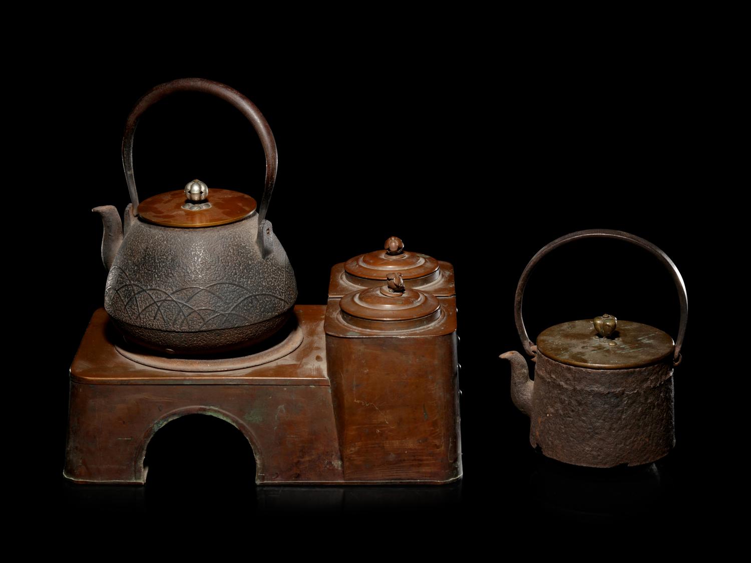 Four Japanese Cast Iron Teapots, Tetsubin , and Copper Burner Stand