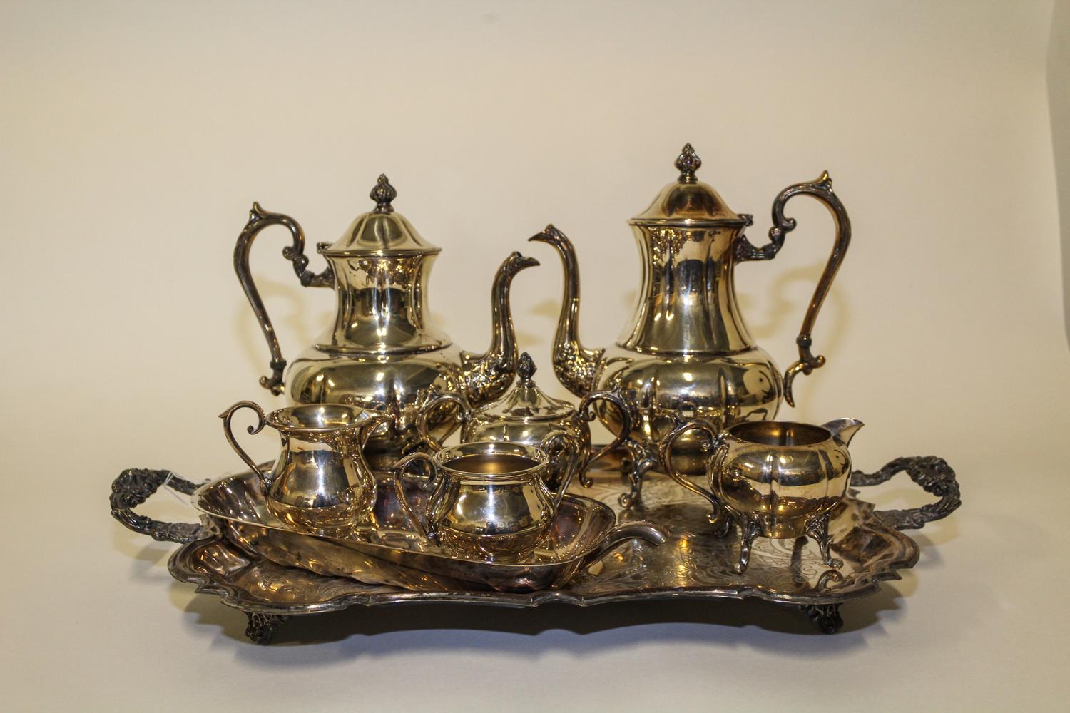 An American Silver-Plate Tea and Coffee Service, Sheridan, Taunton, MA, comprising a teapot, coffee pot, creamer, covered sugar and tra