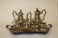 An American Silver-Plate Tea and Coffee Service, Sheridan, Taunton, MA, comprising a teapot, coffee pot, creamer, covered sugar and tra