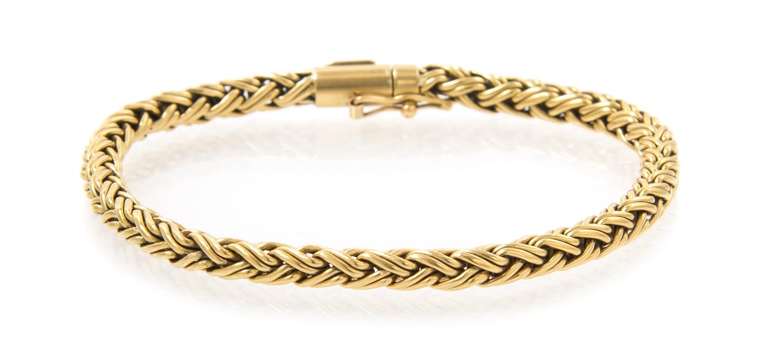 An 18 Karat Yellow Gold Woven Link Bracelet, Tiffany & Co., 8.30 dwts.