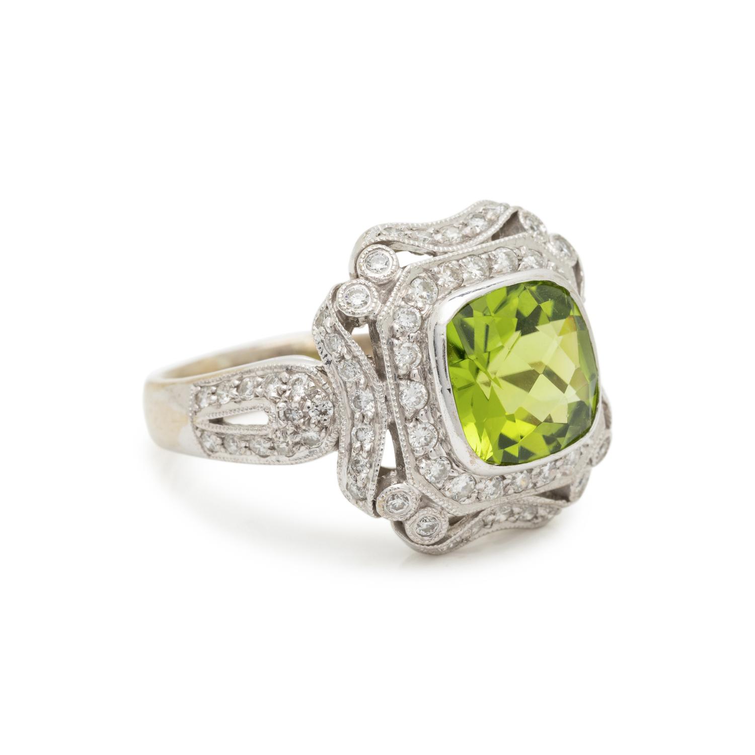 WHITE GOLD, DIAMOND, AND PERIDOT RING