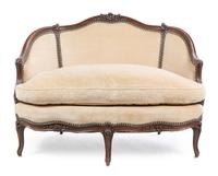 A Louis XV Style Walnut Settee Height 32 x width 44 x depth 31 inches. — LATE 19TH CENTURY