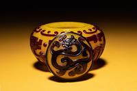 A Small Red Overlay Yellow Peking Glass Covered Jar