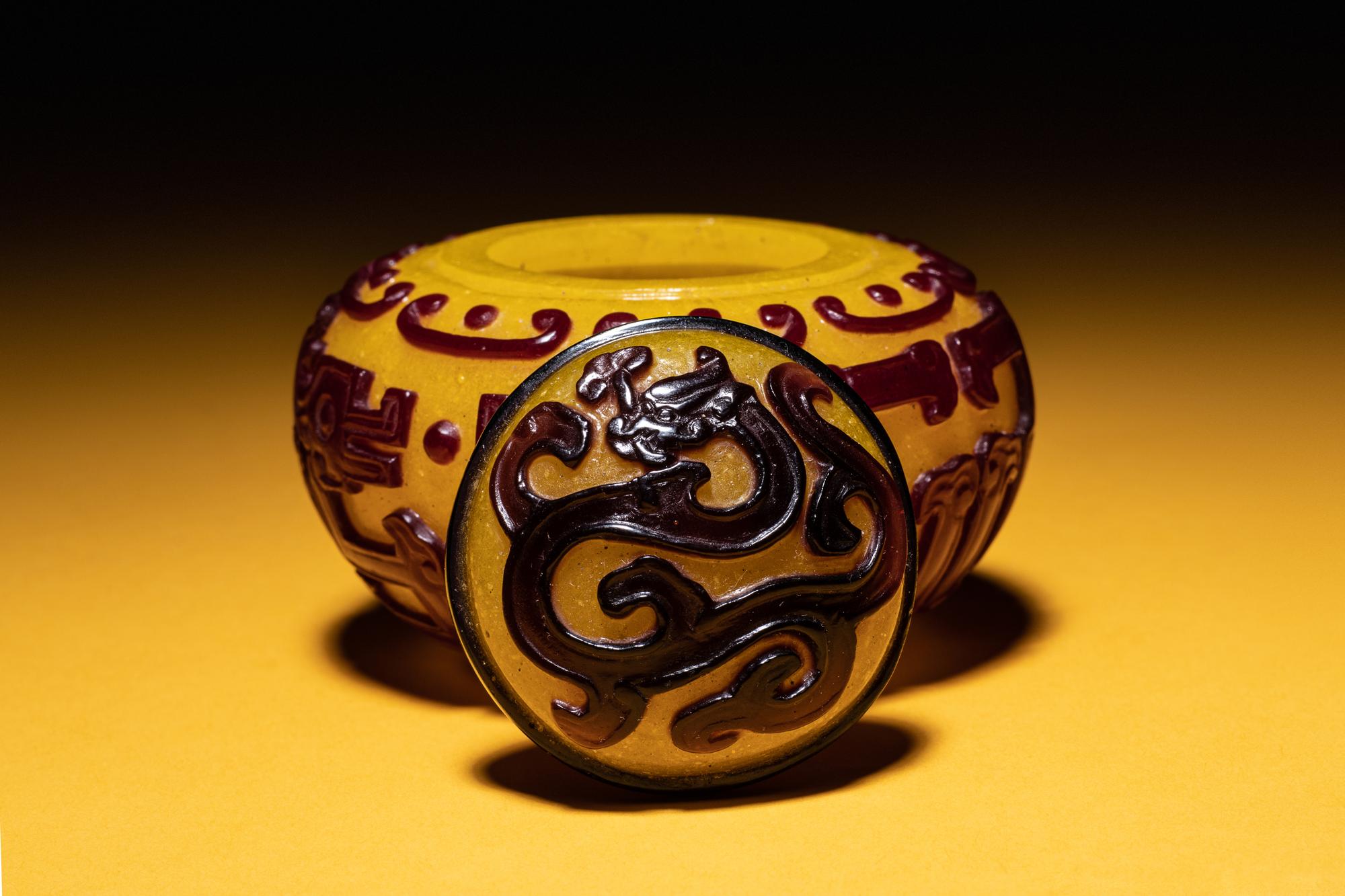 A Small Red Overlay Yellow Peking Glass Covered Jar