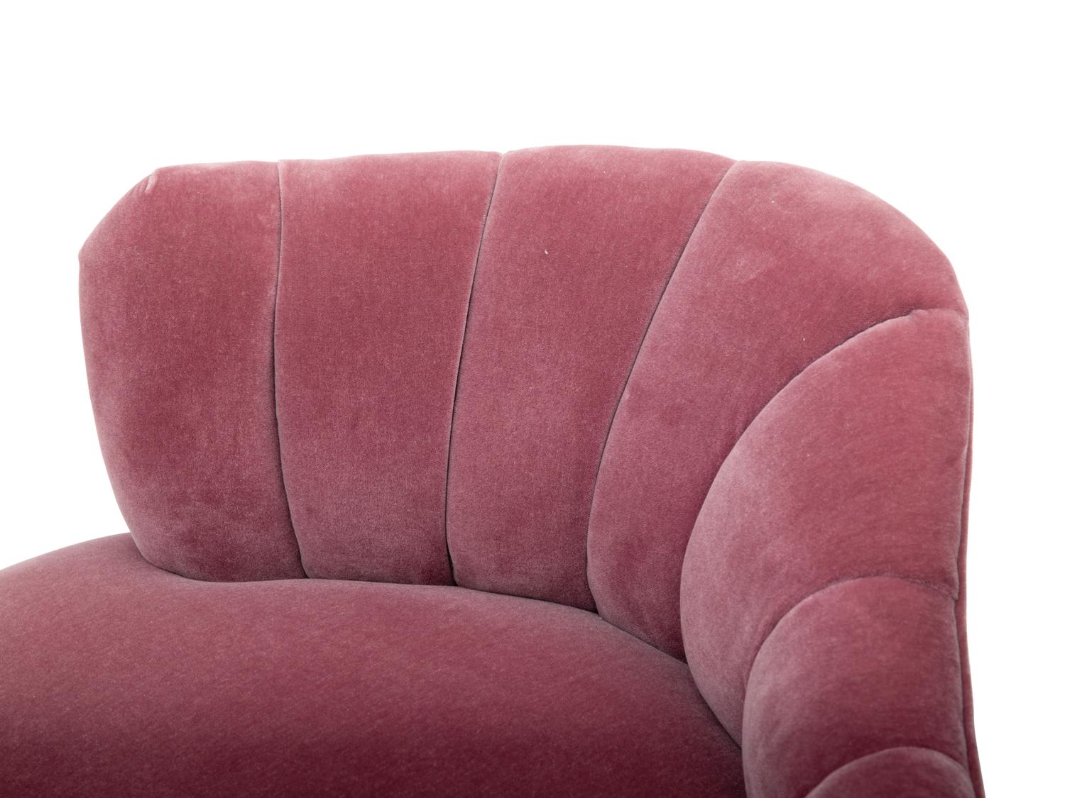 A Pair of Channel-Back Serpentine Lounge Chairs