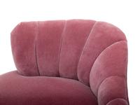 A Pair of Channel-Back Serpentine Lounge Chairs