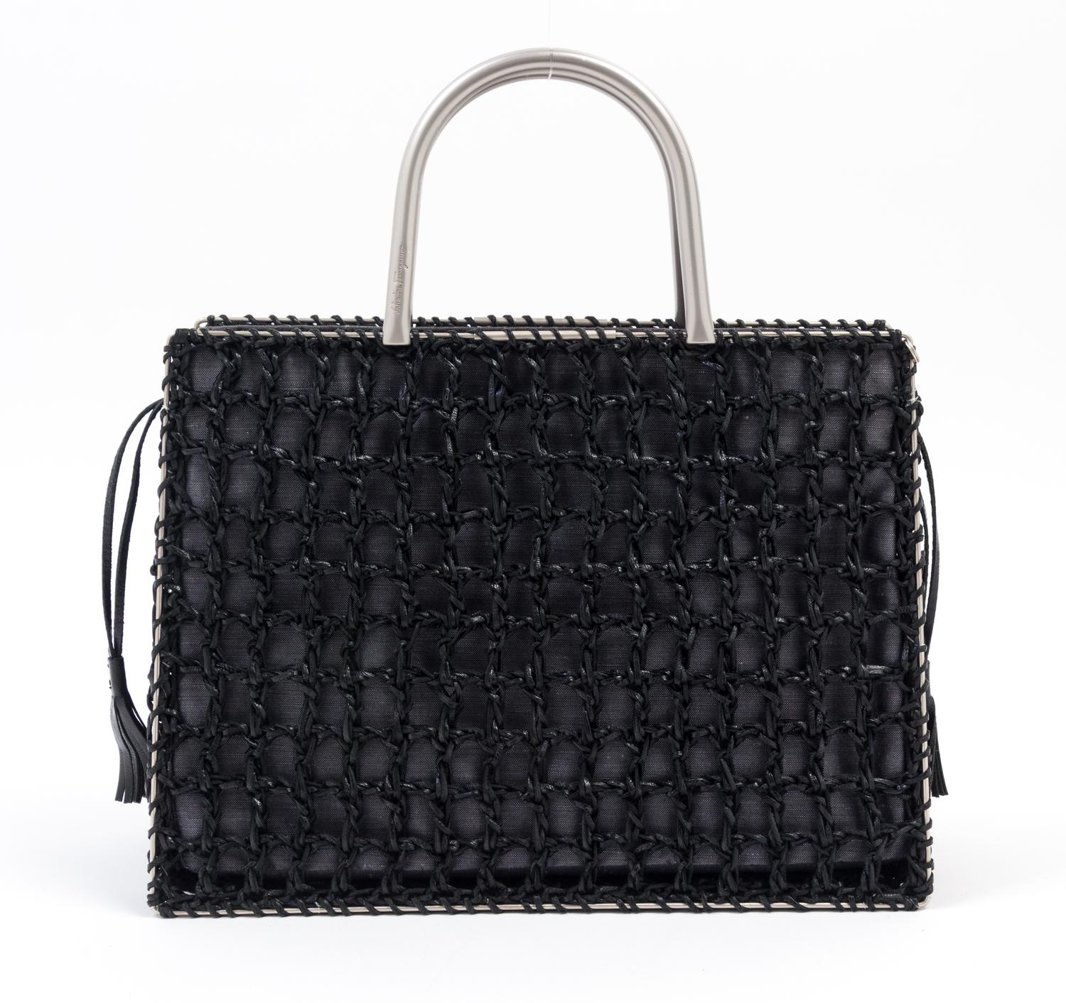 A Salvatore Ferragamo Black Leather Basket Weave Tote, 11" x 8" x 4.5"; Handle drop: 4".