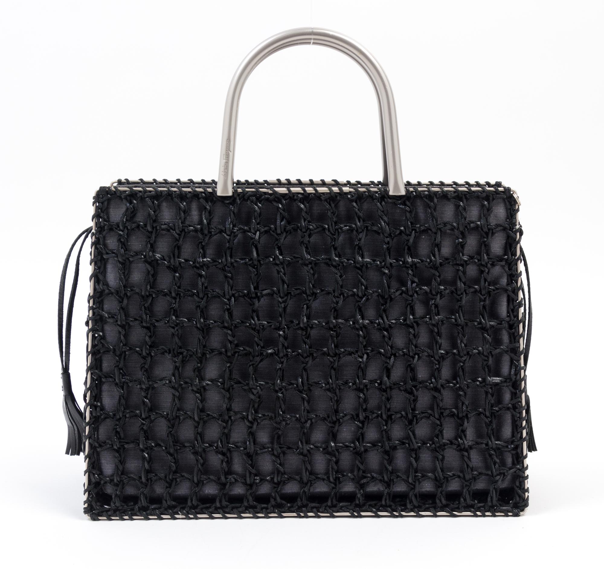 A Salvatore Ferragamo Black Leather Basket Weave Tote, 11" x 8" x 4.5"; Handle drop: 4".