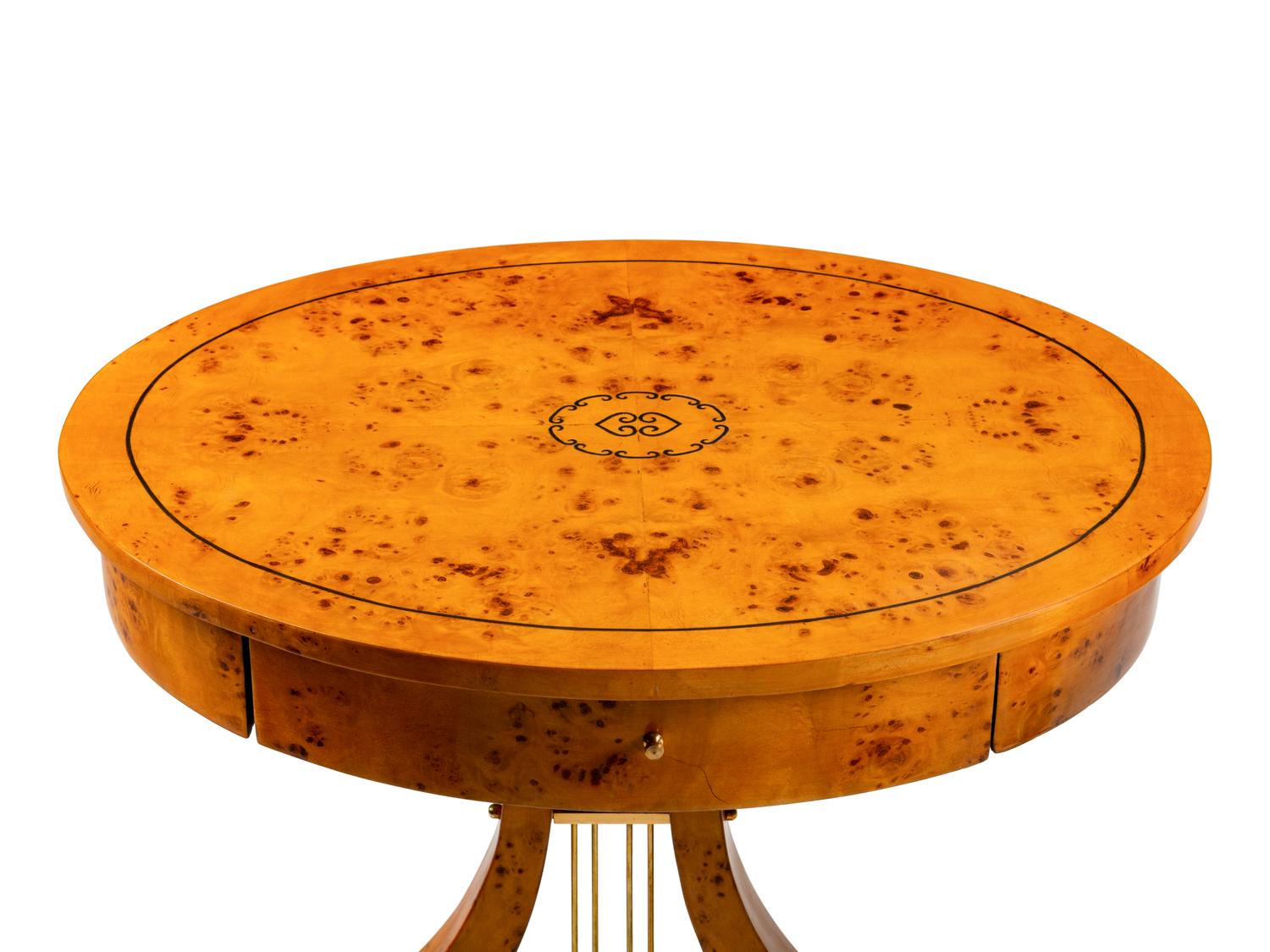 A Pair of Charles X Style Oval Tables en Chiffoniere