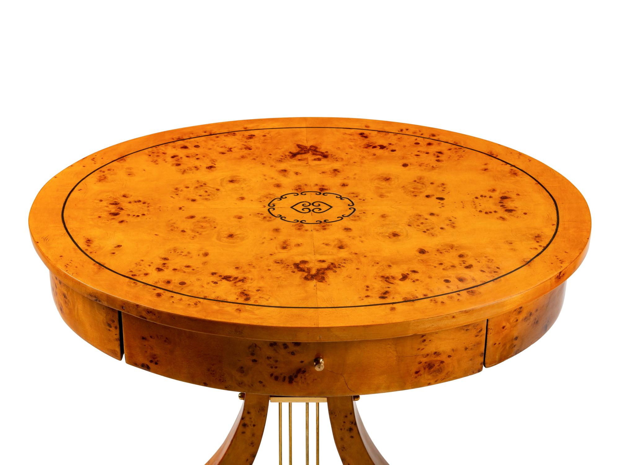 A Pair of Charles X Style Oval Tables en Chiffoniere