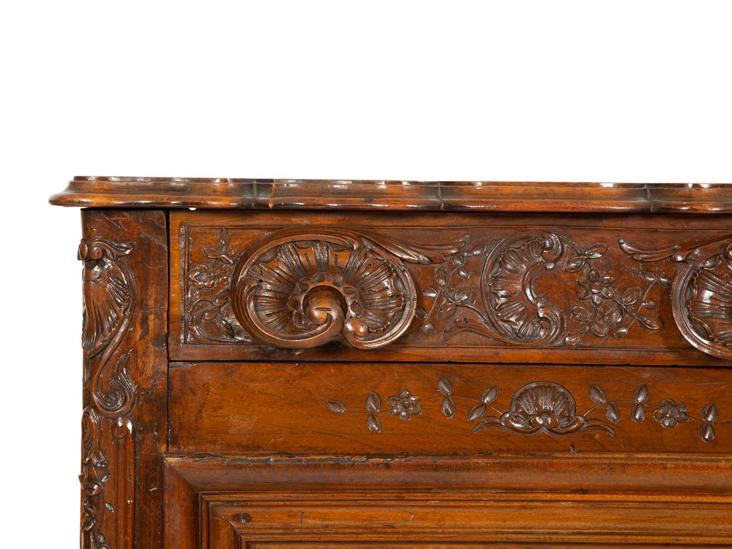 A French Provincial Carved Walnut Panettière