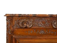 A French Provincial Carved Walnut Panettière
