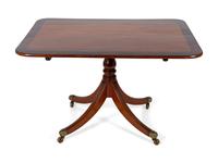 A Regency Cross-banded Mahogany Tilt-top Breakfast Table — EARLY 19TH CENTURY