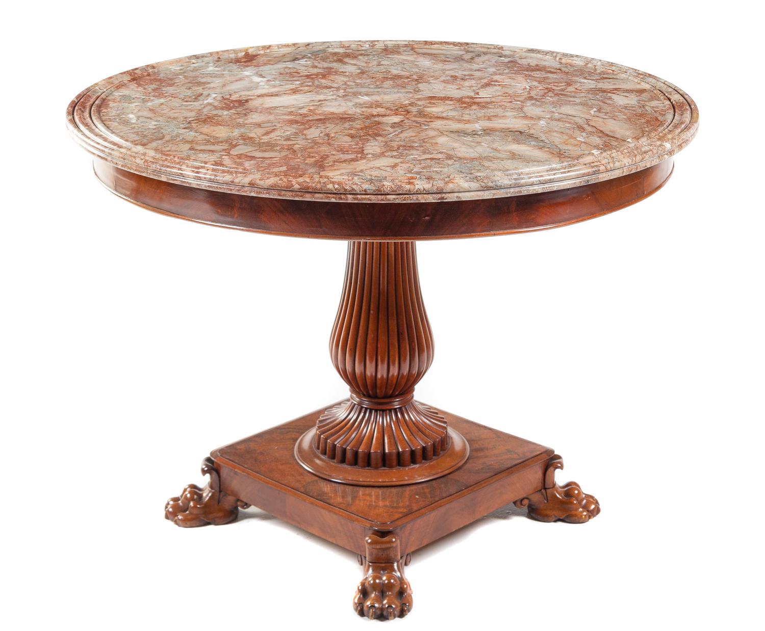 A Charles X Mahogany Center Table Height 30 1/2 x diameter of top 41 inches. — CIRCA 1840