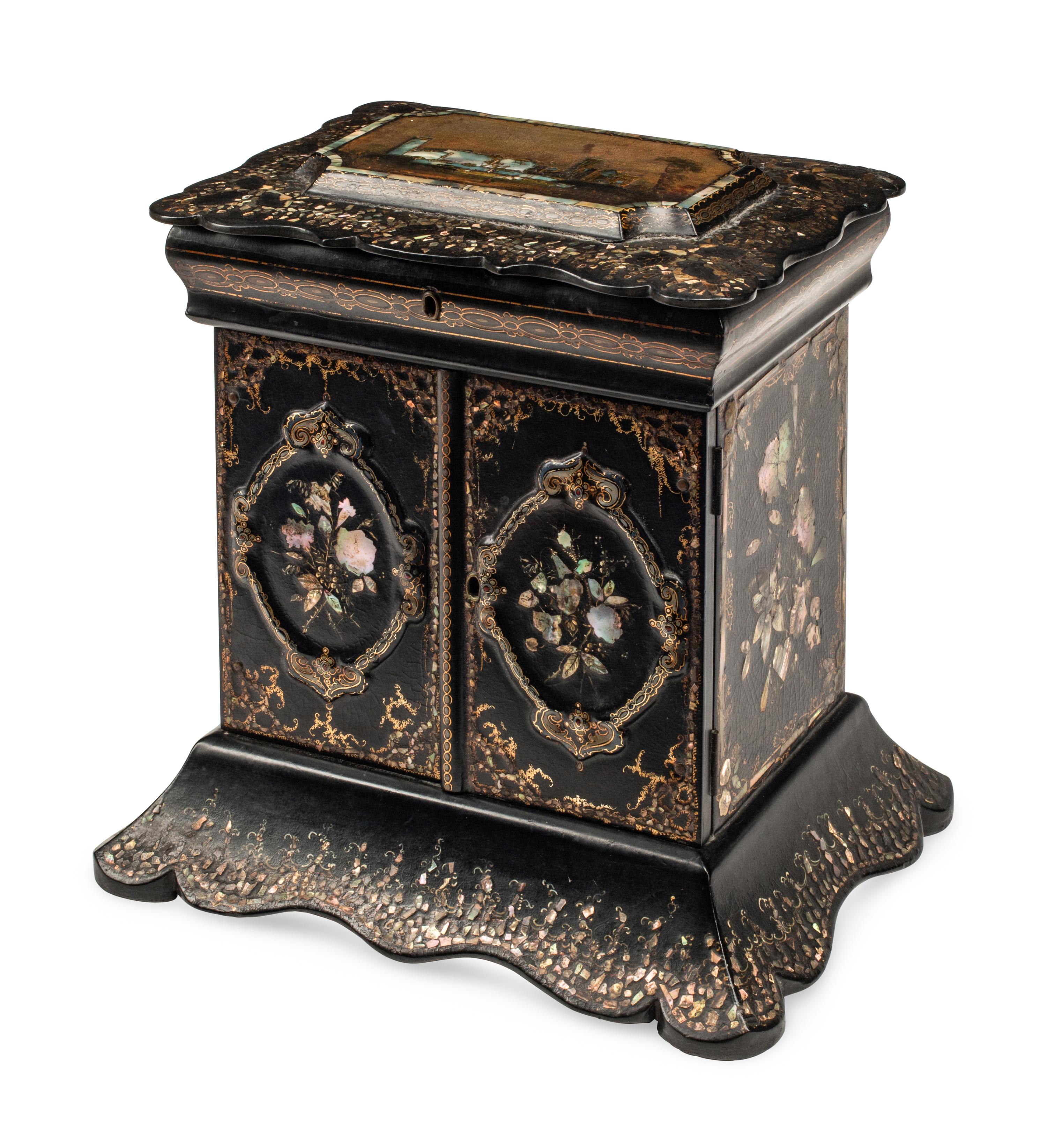 An English Mother-of-Pearl Inlaid Ebonized Cabinet