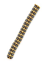 POIRAY, YELLOW GOLD AND HEMATITE BRACELET