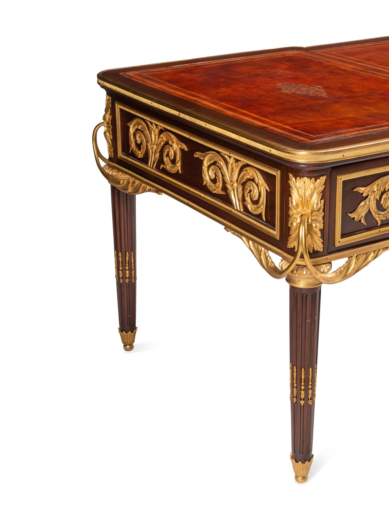 A Louis XVI Style Gilt Bronze Mounted Mahogany Bureau Plat