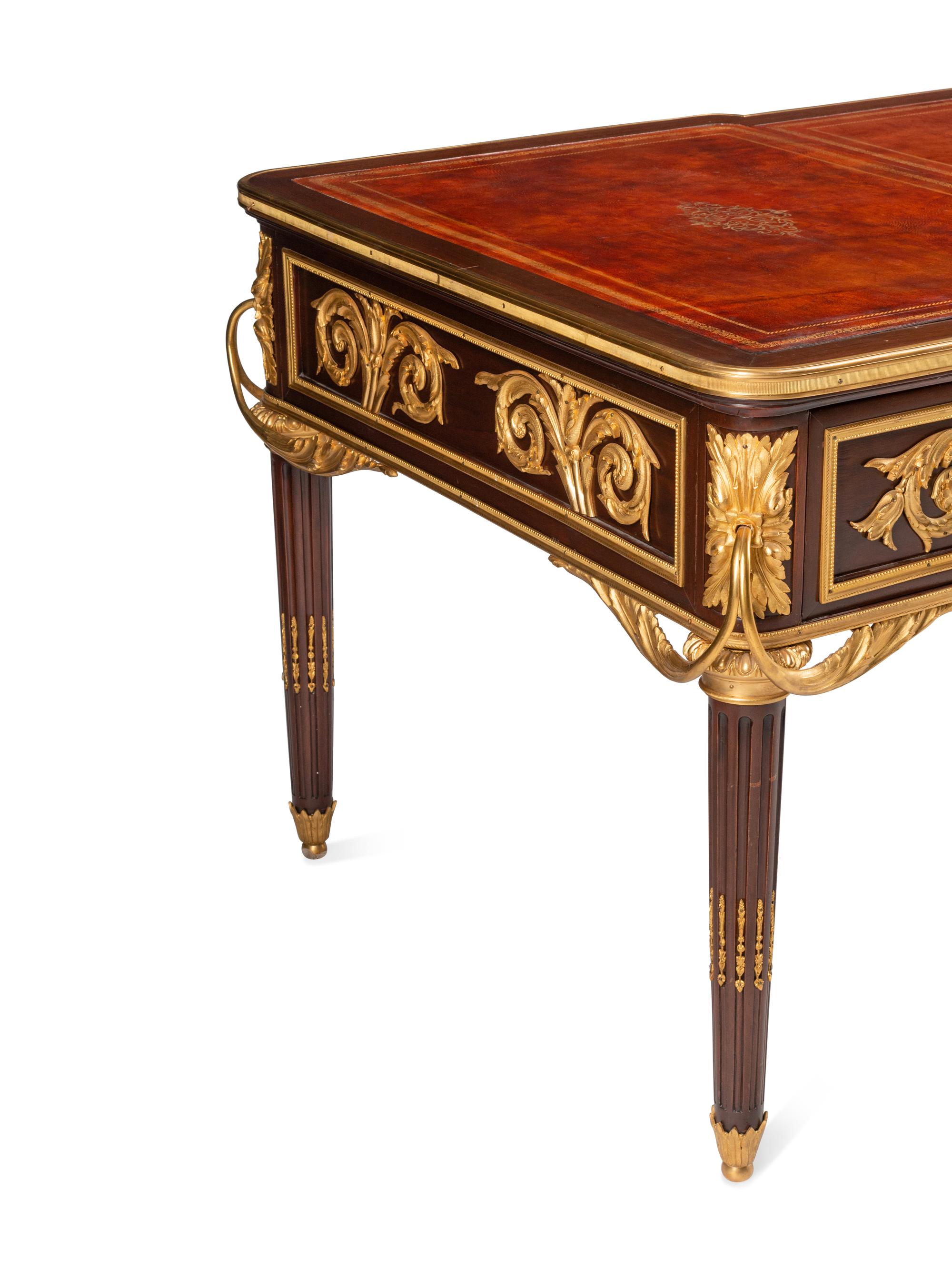 A Louis XVI Style Gilt Bronze Mounted Mahogany Bureau Plat
