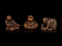 Three Japanese Carved Boxwood Figural-Form Netsuke