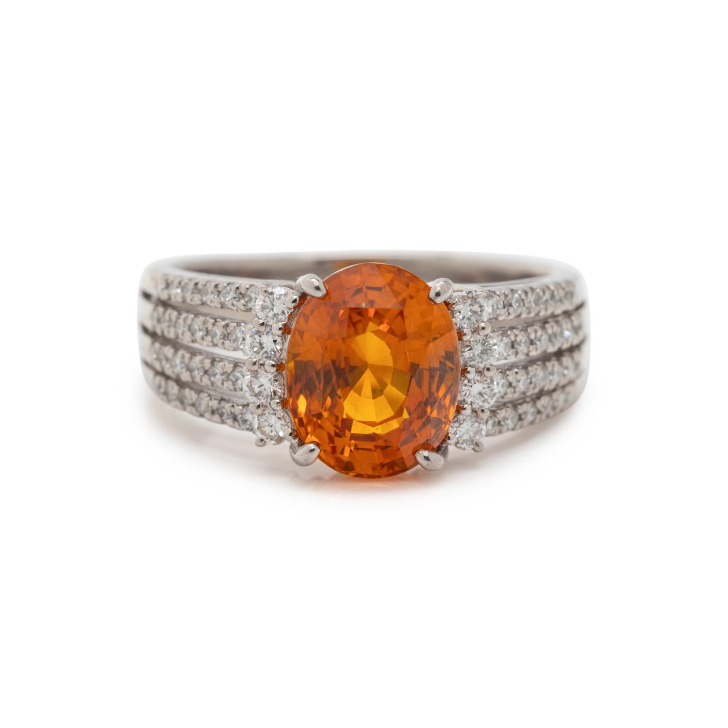 ORANGE SAPPHIRE AND DIAMOND RING