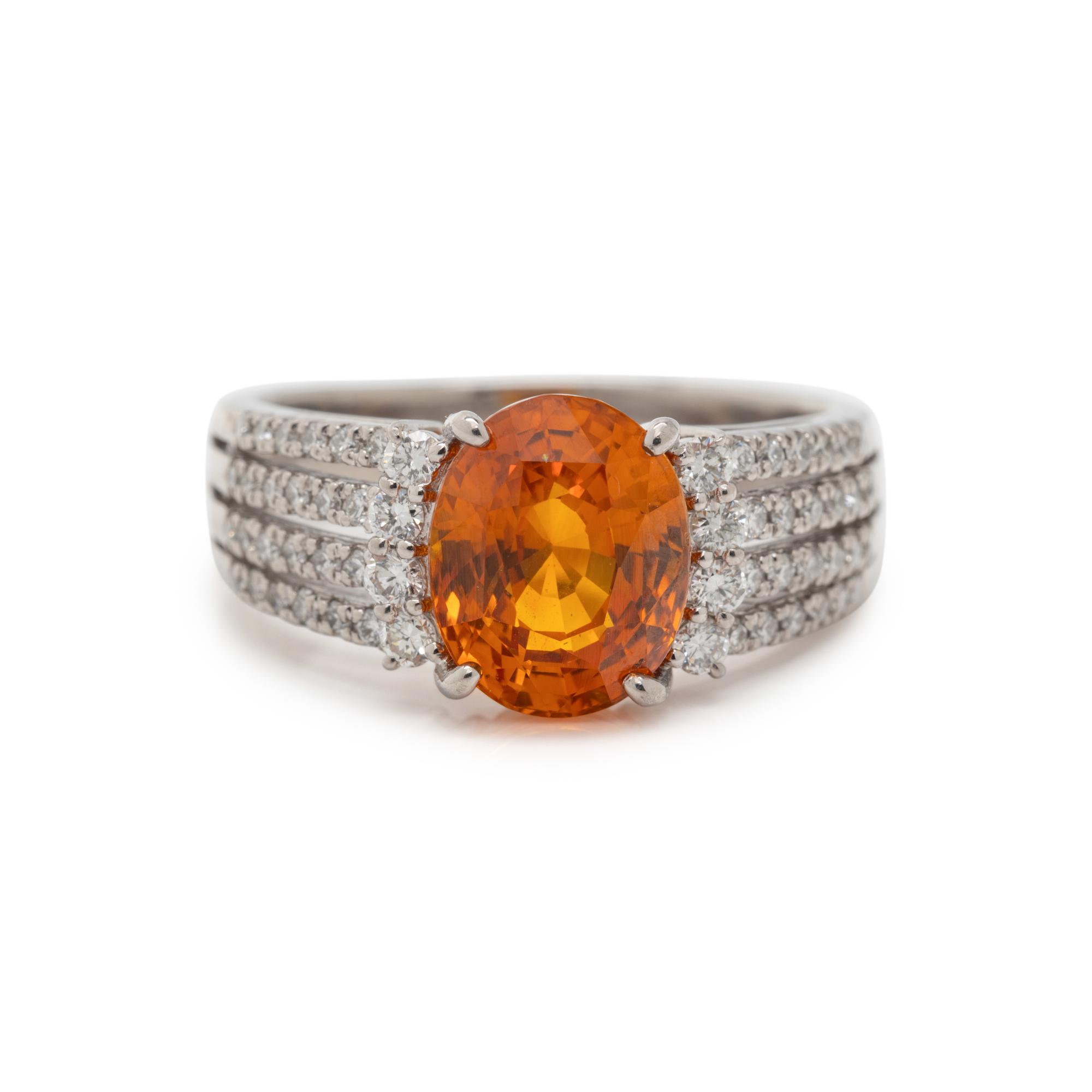 ORANGE SAPPHIRE AND DIAMOND RING
