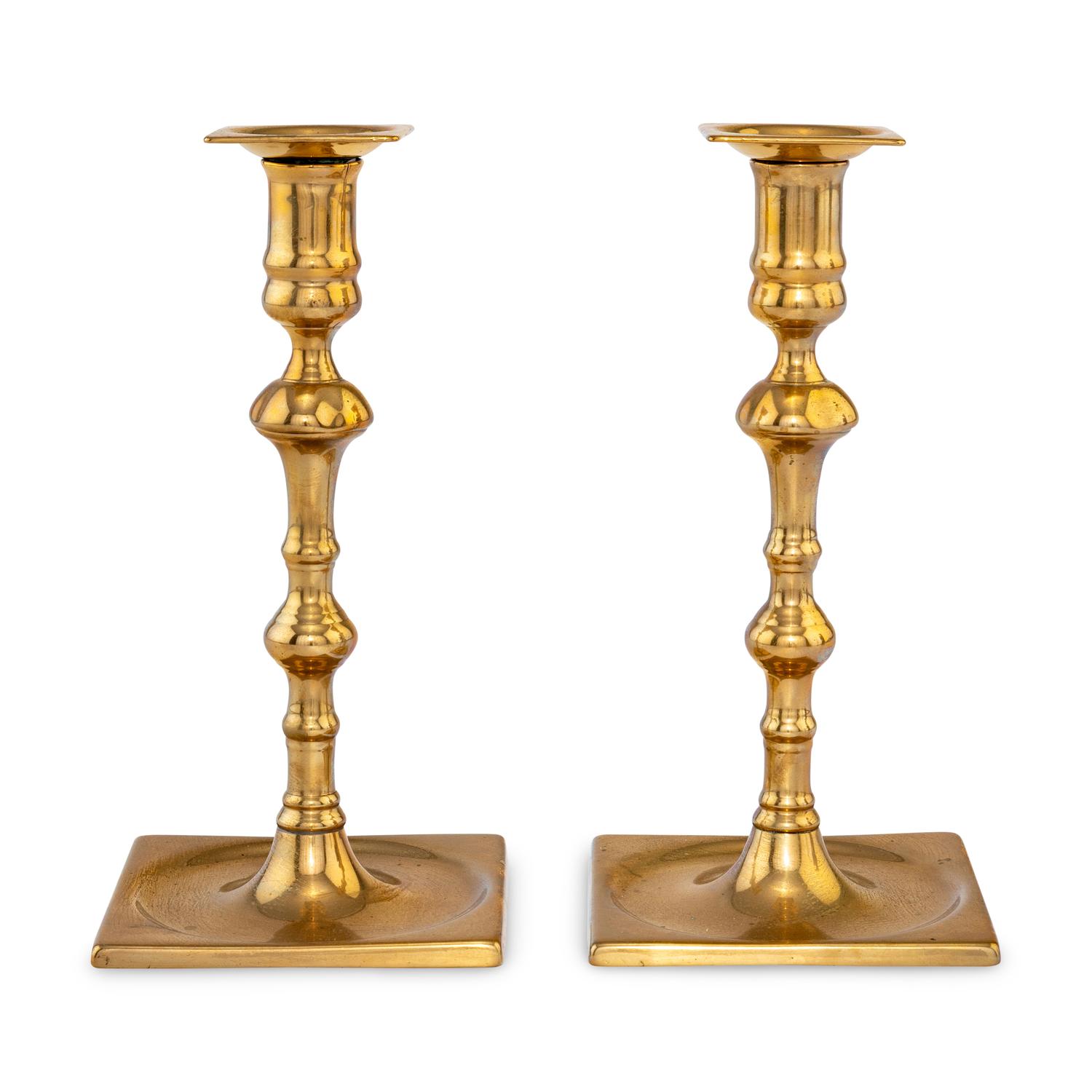 A Pair of George II Bell Metal Candlesticks