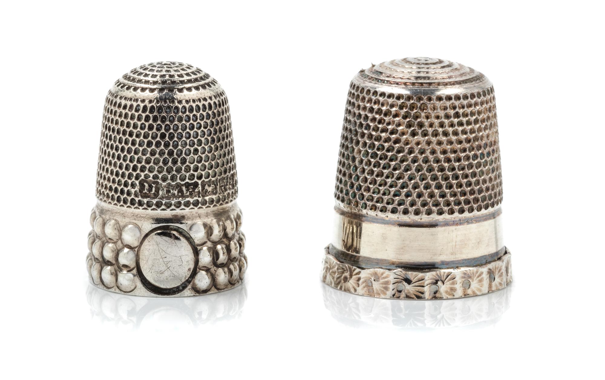 A Group of English Silver Thimbles, , comprising an example with a floral decorated rim, Joseph Swan and Sons, Birmingham, 1962, togeth