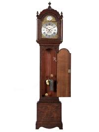 An English Tall Case Clock with Finely Carved Oak Case
