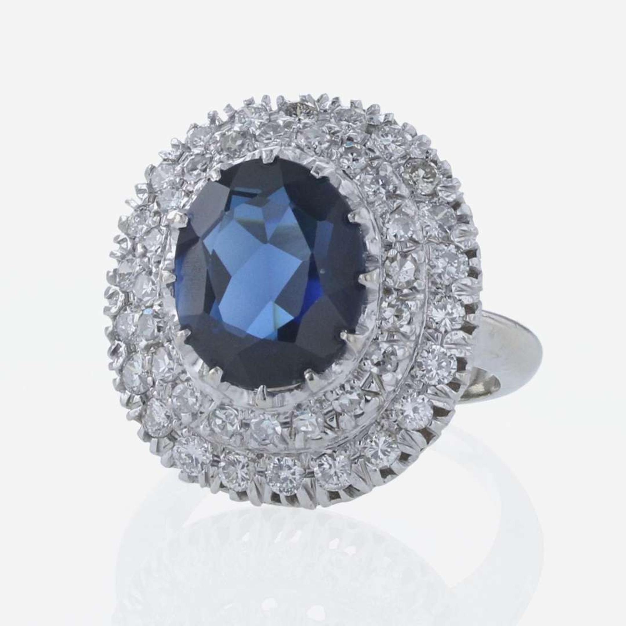 A 14K White Gold, Sapphire, and Diamond Ring